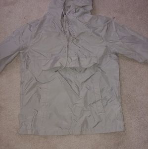 Grey jacket that turns into a bag